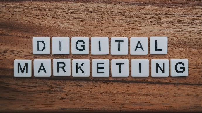 digital marketing artwork on brown wooden surface